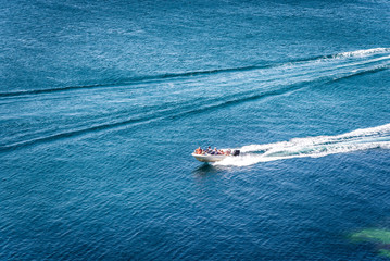 Obraz premium amazing view to yacht and clear dark blue water summer paradise. Copy space