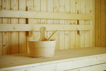 Fototapeta na wymiar wooden sauna bucket accessories interior of sauna spa