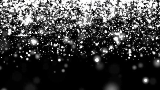 Silver glitter rain falling down on black background.