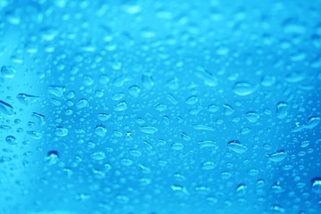 Naklejka na ściany i meble water drops on blue background