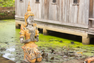 Old thai angel statue in temple