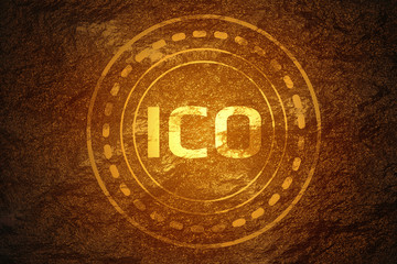 Crypto currency mining concept. Initial Coin Offering (ICO) found underneath hard rock soil and shining its gold flare color as a high value treasure. 
