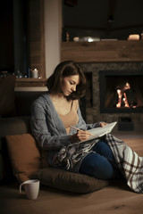 Obraz premium A Woman Enjoying Winter at Home