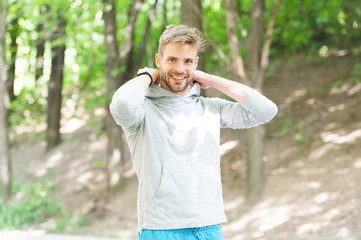 Feeling comfortable. Guy bearded attractive casual put hood on . Man with bristle smiling face...