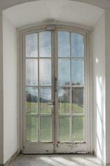 French door with a nature view behind glass (contains clipping path)