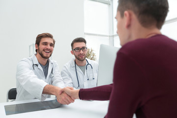 Fototapeta premium handshake of a doctor and his patient