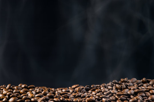 fresh roasted coffee beans with smoke