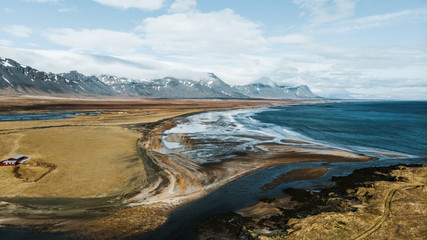 aerial view of beautiful seashore with mountains on background, snaefellsnes, iceland