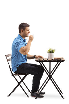 Young Man Drinking Coffee Isolated On White Background