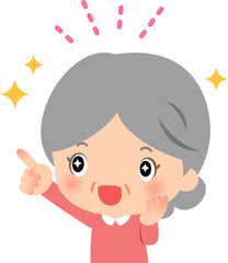 喜びの表情で指をさすシニア女性