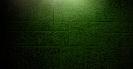 Vignette and light on green brick wall background