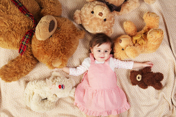many of toys around the little girl