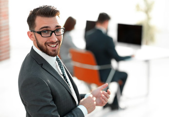 Fototapeta premium modern businessman on blurred background office.