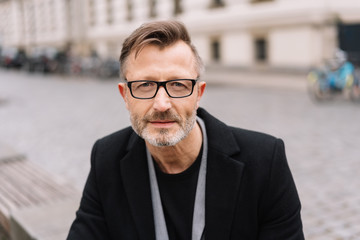 Thoughtful intense bearded man