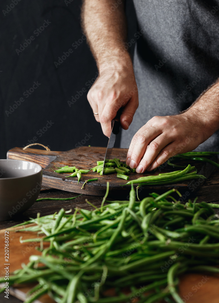 Sticker Man cutting green bean wooden cutting board Healthy vegetarian food