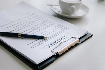 Contract application and pen to Signing of Business Agreement.