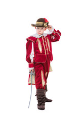 Little boy posing in musketeer suit