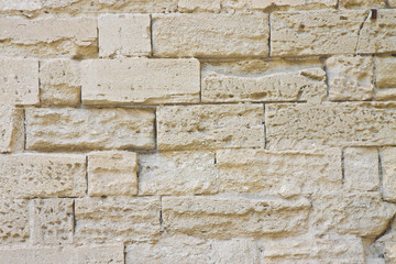 Damaged sandstone wall