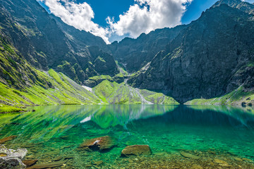 Fototapeta premium Black lake under Rysy peak, Tatra Mountains, Poland