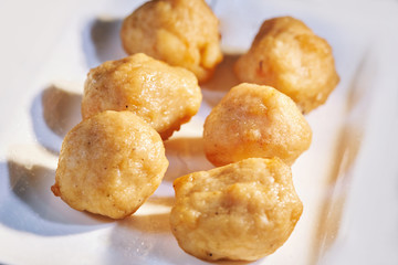 Fried steamed shrimp balls on white plate, Close-up with shallow depth of field