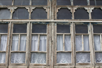 Vintage windows with curtains