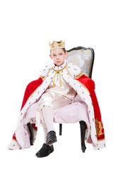 Cute boy wearing costume of a king