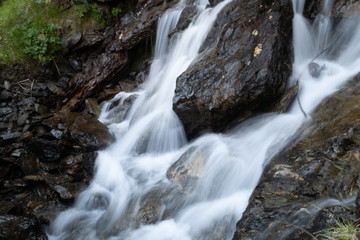 Fototapeta na wymiar Viola creek, Stelvio National Park, Alps, Italy