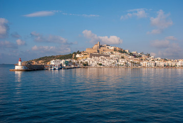 Fototapeta na wymiar Ibiza old Town, Eivissa - Battlements seen from the sea on a clam summers day. 