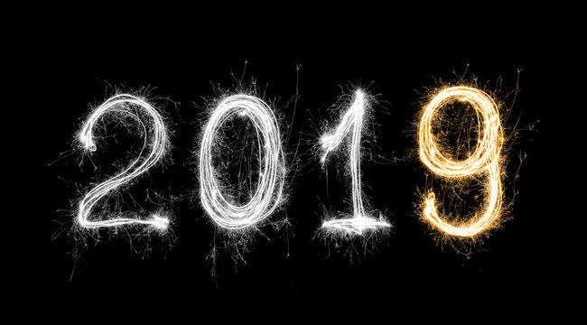 isolated 2019 written with Sparkle firework on black background, happy new year 2019 concept.