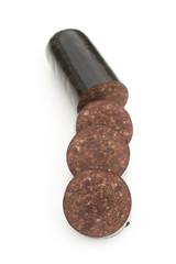 Black pudding blood sausage isolated on a white studio background.