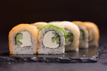 Sushi roll with cream cheese, sesame. Japanese food