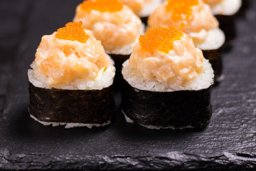 Sushi roll with cream cheese, sesame. and spice Japanese food