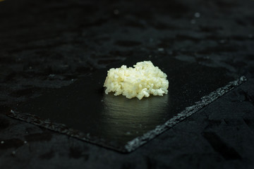 Rice on black chalkboard with a copyspace