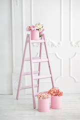 House interior in pink and white tones. It can be used as a background