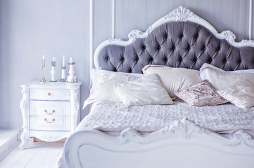 The bedroom in black and white tones. It can be used as a background