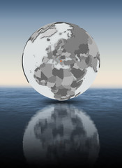 Macedonia on globe above water