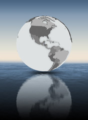 Belize on globe above water