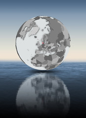Naklejka premium Denmark on globe above water