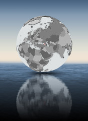 Georgia on globe above water