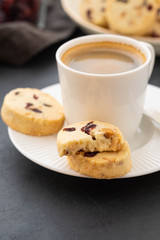 Closeup of cookies and a cup of coffee. Symbolic image. Concept for a tasty snack. Sweet dessert. Selective focus. Close up.