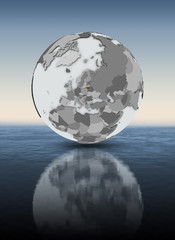 Lithuania on globe above water