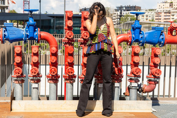 Young Indian woman posing in an urban context