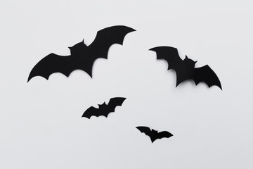 Fototapeta premium halloween and decoration concept - paper bats flying