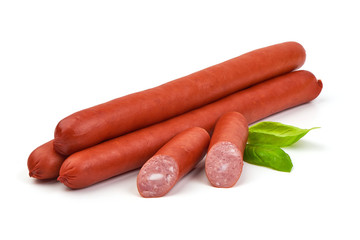 Long and fatty sausages with basil leaves, isolated on white background.