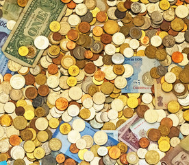 Lots of different money. Banknotes and coins.