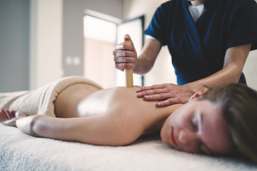 Obraz na płótnie Canvas Thai massage therapist treating patient