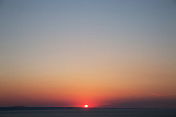 beautiful landscape of the ocean. Sea coast on a sunset