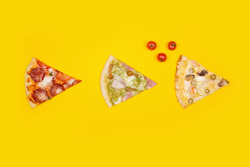 Three slices of pizza and ingredients on a yellow background