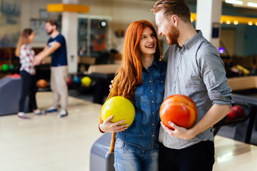 Beautiful couple dating and bowling