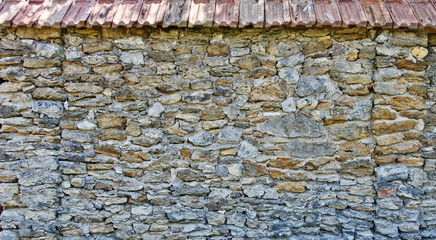 Texture of an old stone wall. Closeup